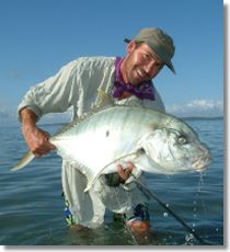 Nat with a lovely Golden Trevally from the flats at Hervey Bay